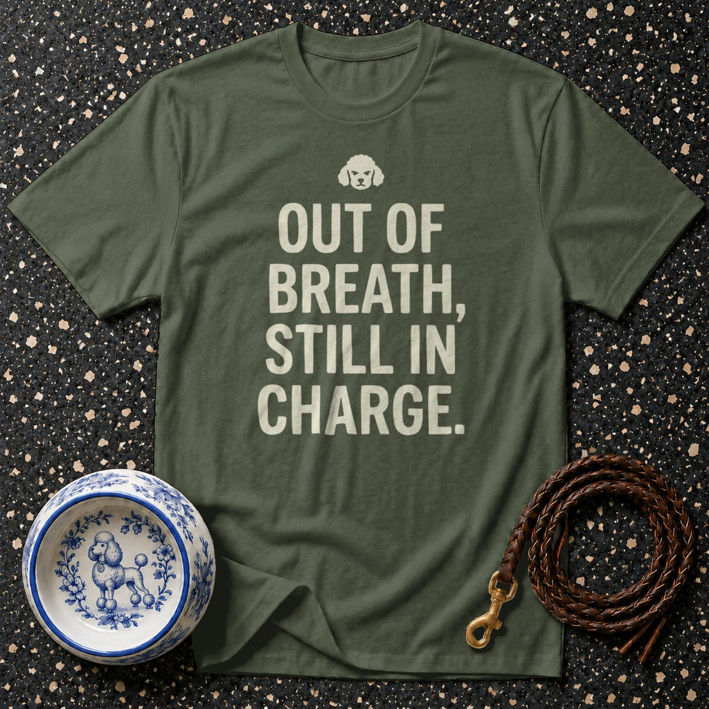 Green t-shirt with white text "OUT OF BREATH, STILL IN CHARGE."