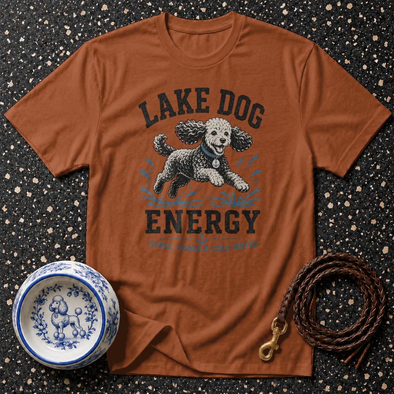 T-shirt with "Lake Dog Energy, Curls, Chaos & Cold Water" text and a poodle graphic.