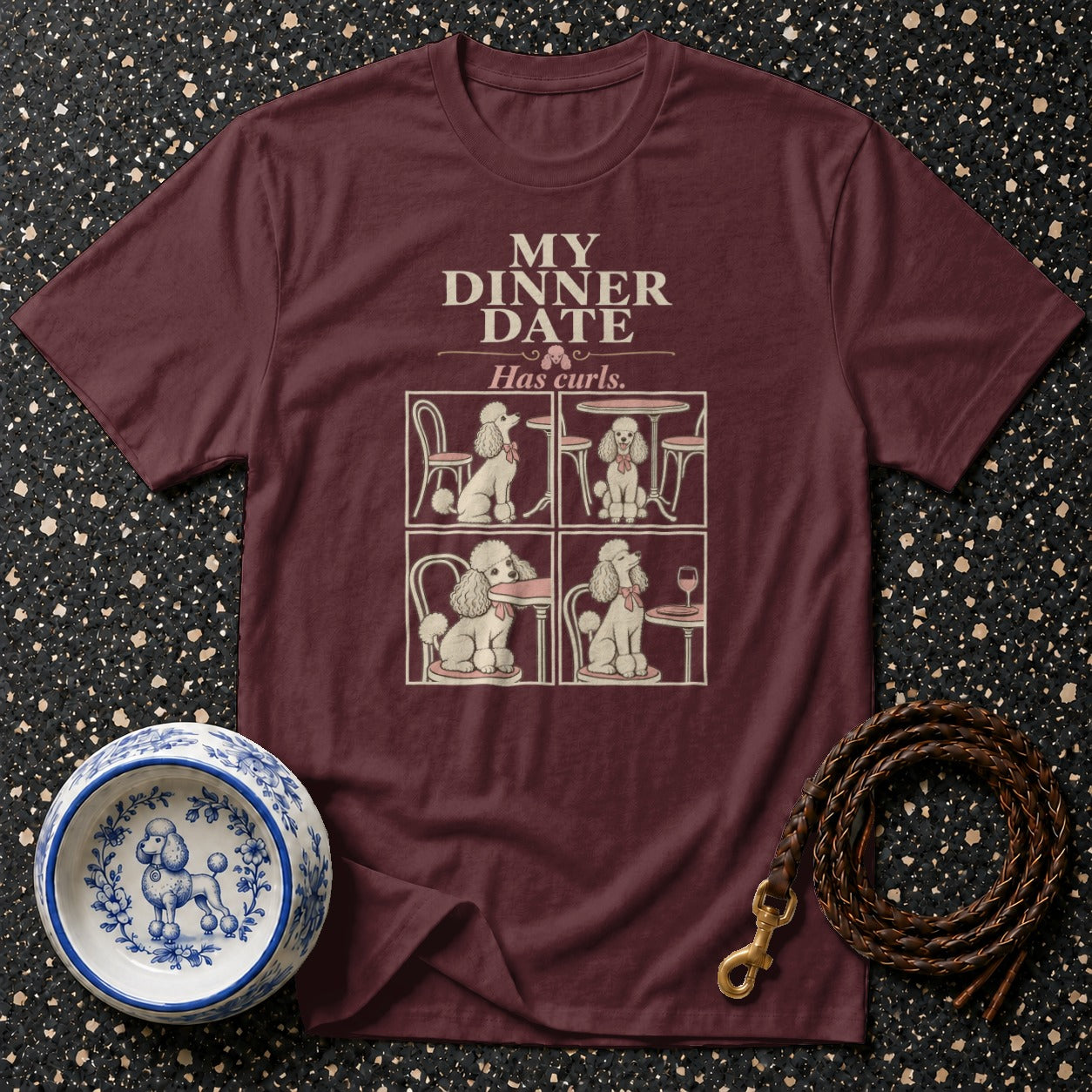 Maroon t-shirt with "My Dinner Date Has Curls." and poodle illustrations.