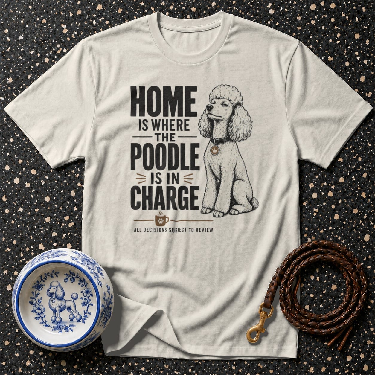 T-shirt with text "Home is where the poodle is in charge" and a poodle illustration.