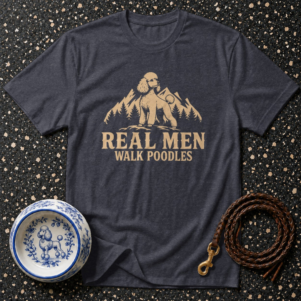 T-shirt with "Real Men Walk Poodles" text and a poodle on a mountain.
