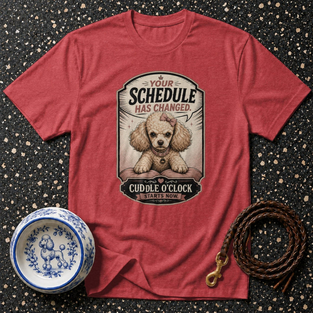 Red t-shirt featuring a poodle illustration with text "Your Schedule Has Changed. Cuddle o'clock starts now."