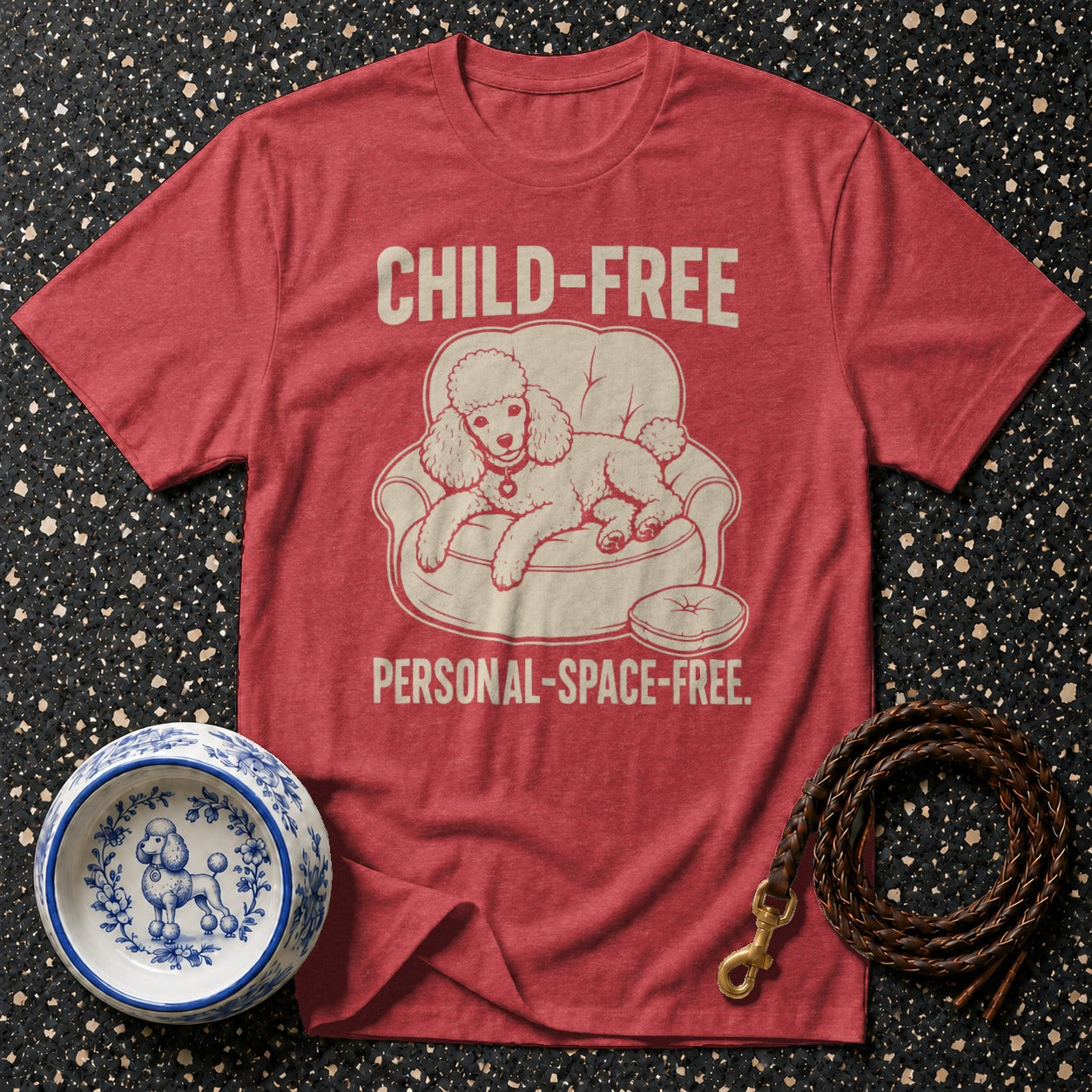 Red t-shirt with graphic of poodle on couch saying "Child-free personal space-free".