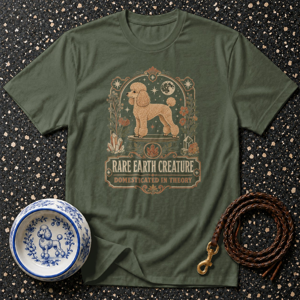Green t-shirt with poodle graphic and text "Rare Earth Creature Domesticated in Theory".