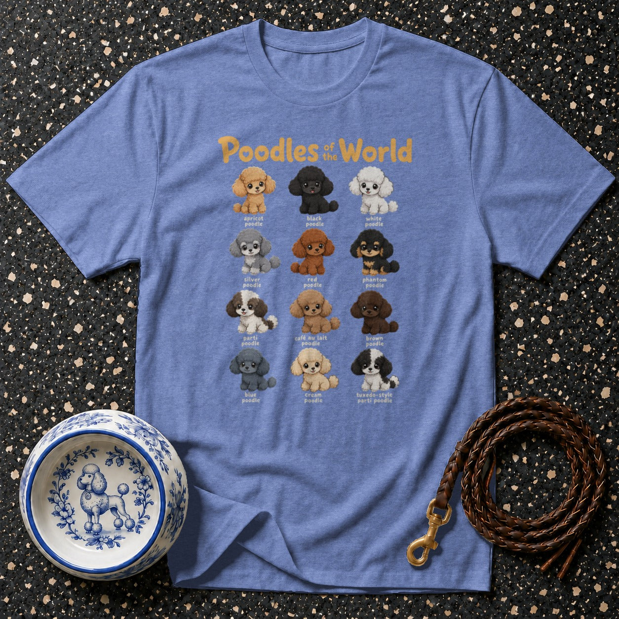 Blue t-shirt with text "Poodles of World" and illustrations of poodles in various colors.