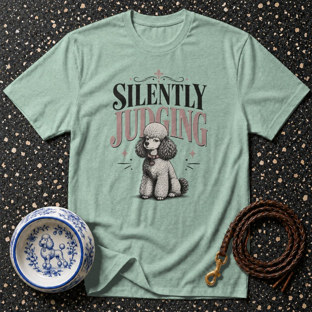 Light blue t-shirt with a poodle graphic and text "SILENTLY JUDGING".