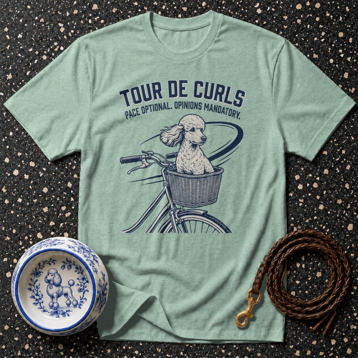 Light green t-shirt with "TOUR DE CURLS" and a poodle in a bicycle basket.