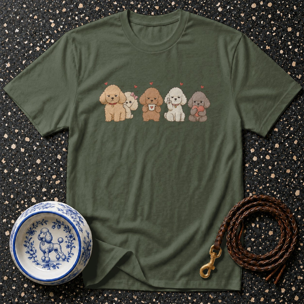 Green t-shirt with five cartoon poodles and a decorative dog bowl.
