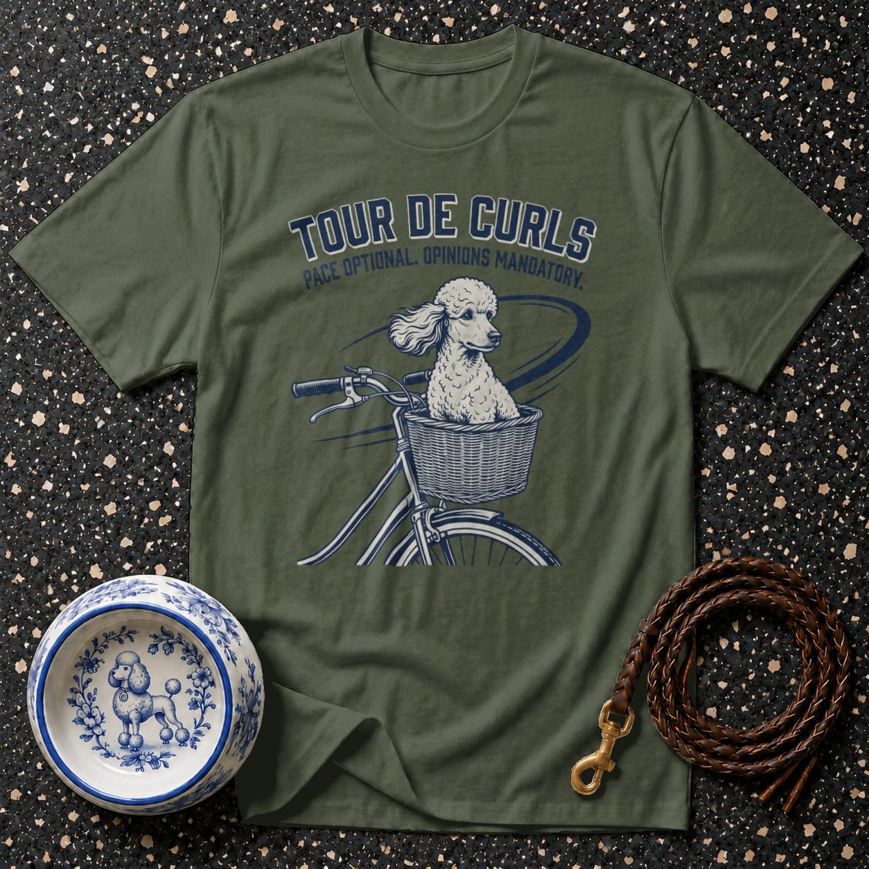 Green t-shirt with poodle in bicycle basket and text "Tour de Curls."