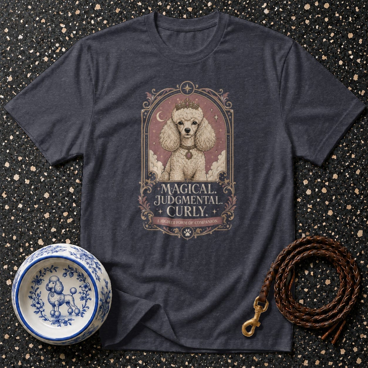 Dark t-shirt with a poodle illustration and text "MAGICAL. JUDGMENTAL. CURLY."