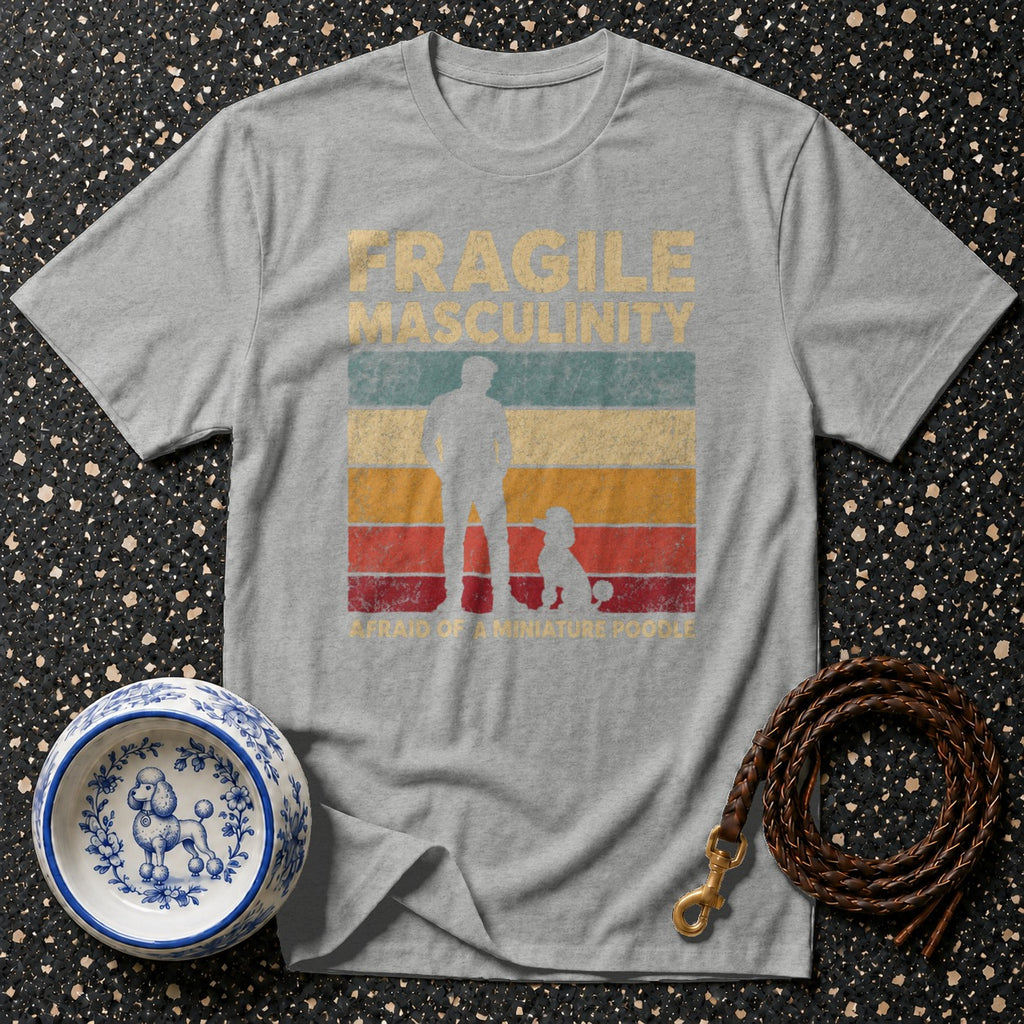Grey t-shirt with "Fragile Masculinity, Afraid of a Miniature Poodle" text and silhouettes.