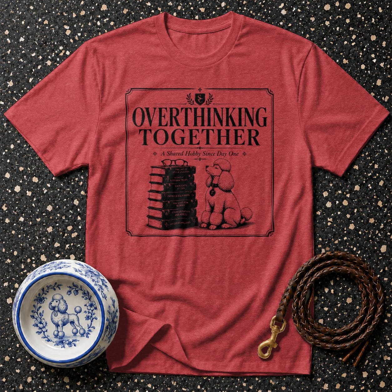 Red t-shirt with "Overthinking Together" graphic featuring poodle and stack of books.