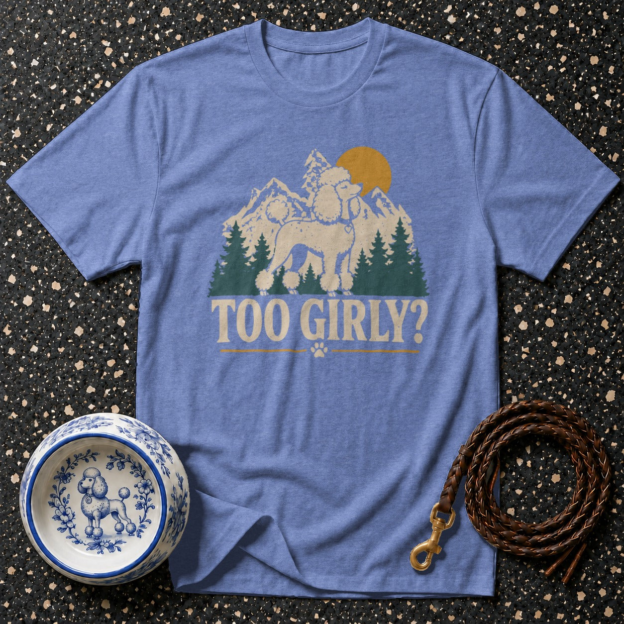 Light blue t-shirt with poodle graphic and text "TOO GIRLY?".