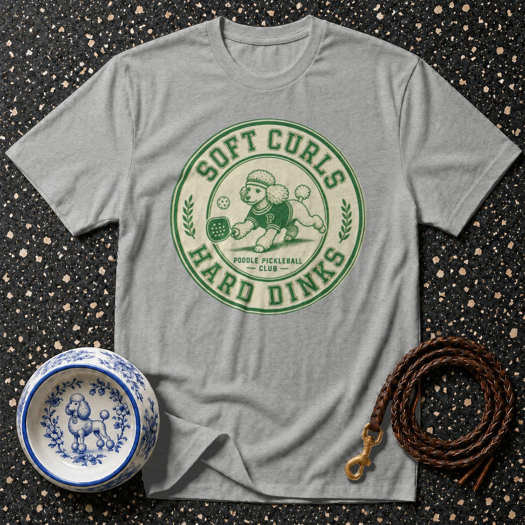 Gray t-shirt with "Soft Curls Hard Dinks Poodle Pickleball Club" logo.