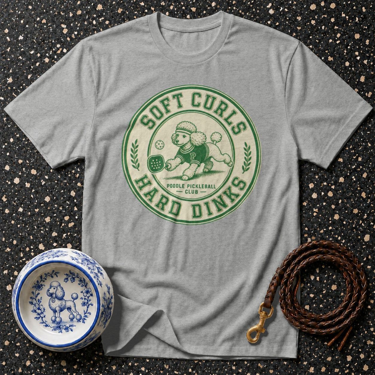 Gray t-shirt with "Soft Curls Hard Dinks Poodle Pickleball Club" logo.
