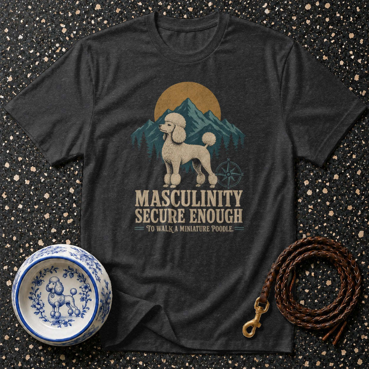 Dark gray t-shirt with a poodle illustration and the text "Masculinity Secure Enough".