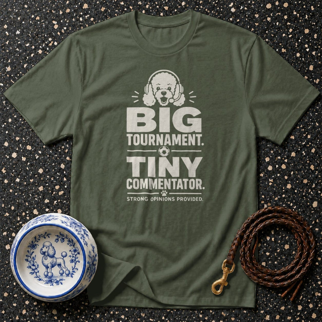 Green t-shirt with white text: "BIG TOURNAMENT. TINY COMMENTATOR. STRONG OPINIONS PROVIDED."