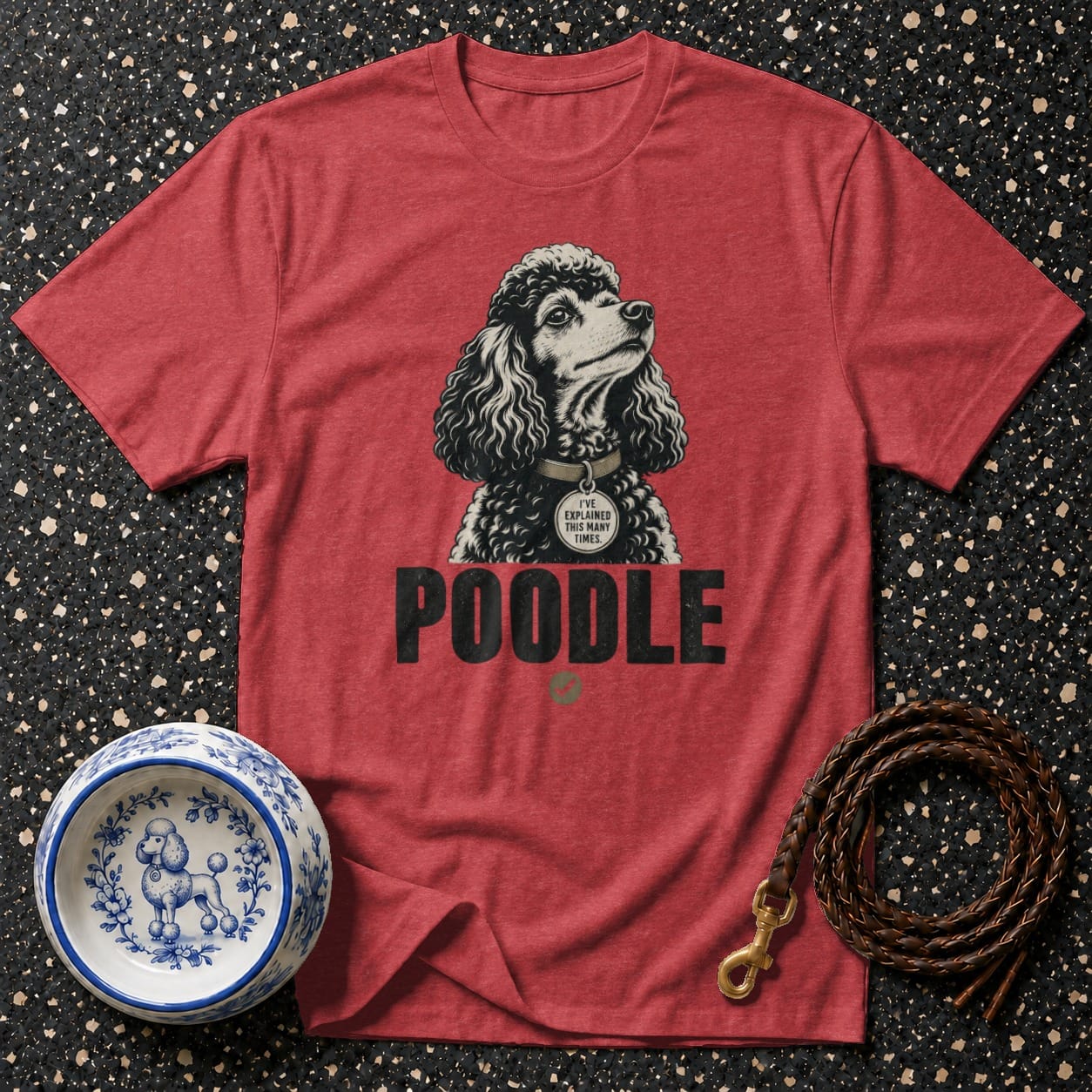 Red t-shirt with poodle graphic, "POODLE" text, dog bowl, and leash.