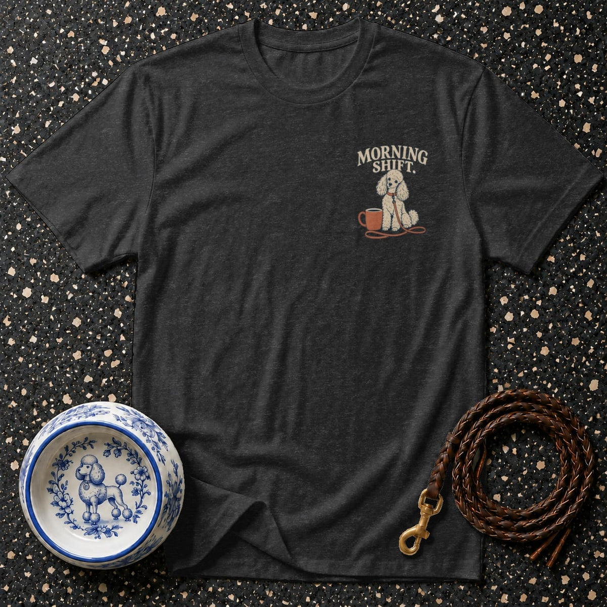 Dark grey t-shirt with poodle, coffee cup, and text "MORNING SHIFT." graphic.