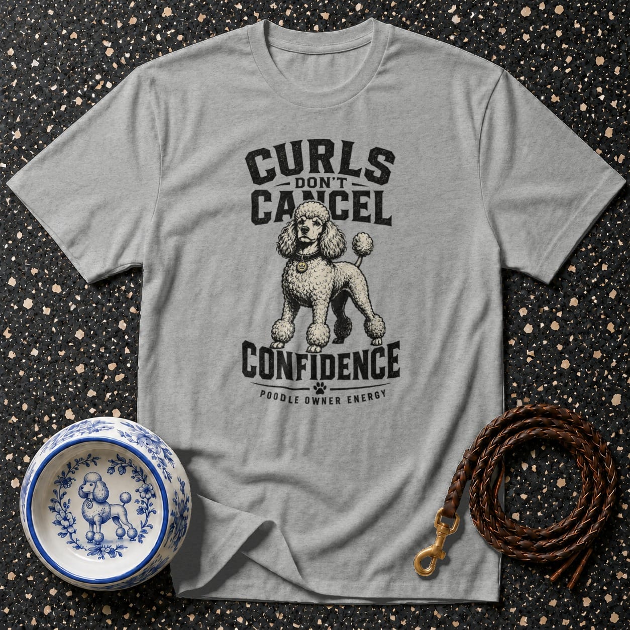 Gray t-shirt with poodle graphic and text "Curls Don't Cancel Confidence"