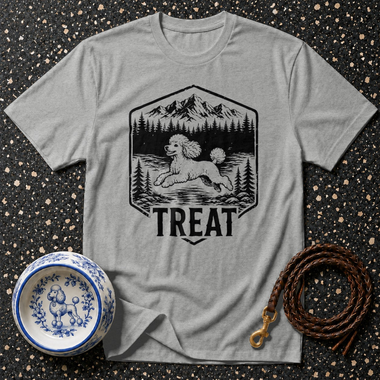 Gray t-shirt with poodle running in mountains graphic and the word "TREAT"