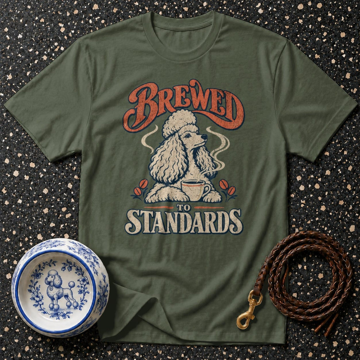 Olive green t-shirt with "BREWED TO STANDARDS" text and poodle enjoying coffee.