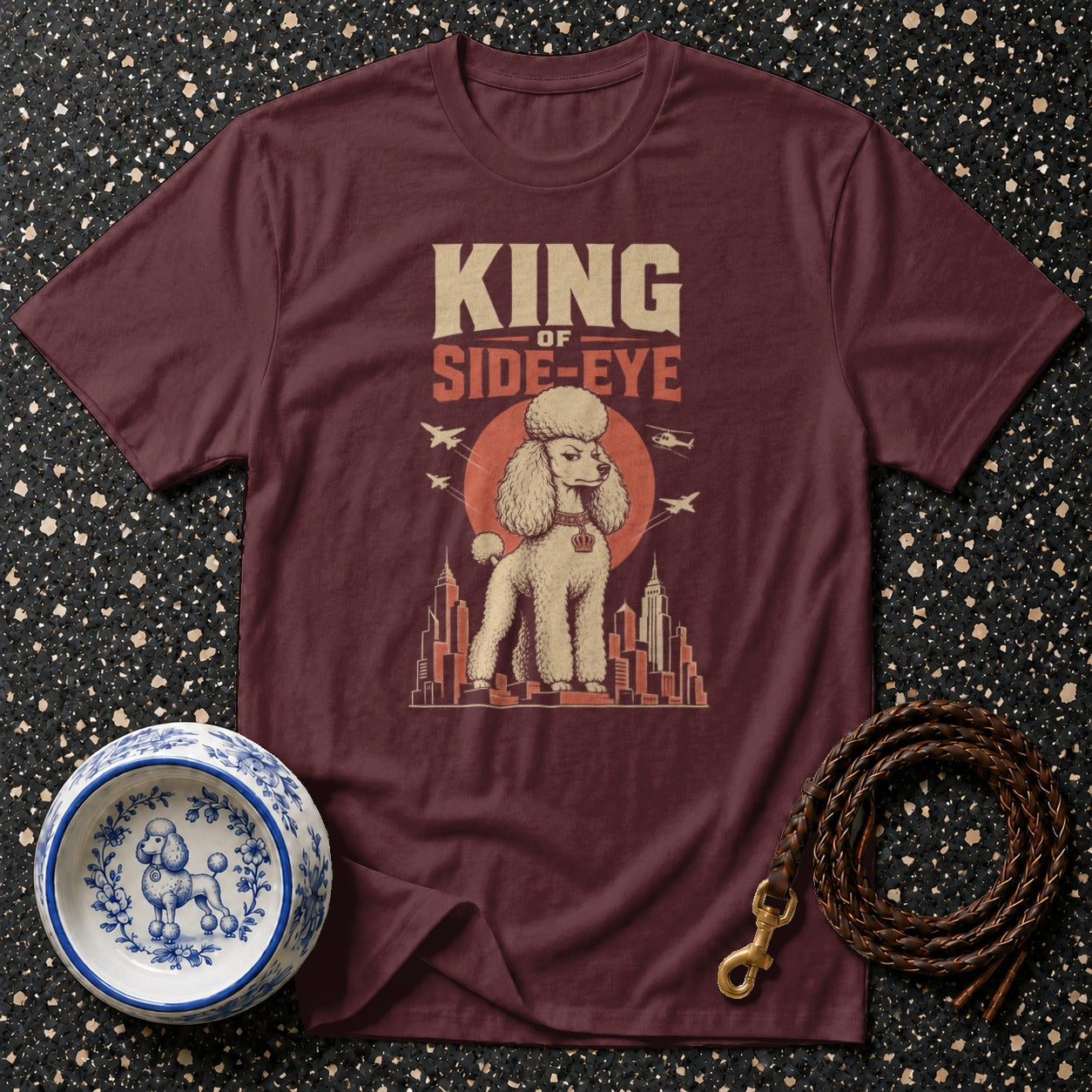 Maroon t-shirt with "KING OF SIDE-EYE" text and a poodle illustration.