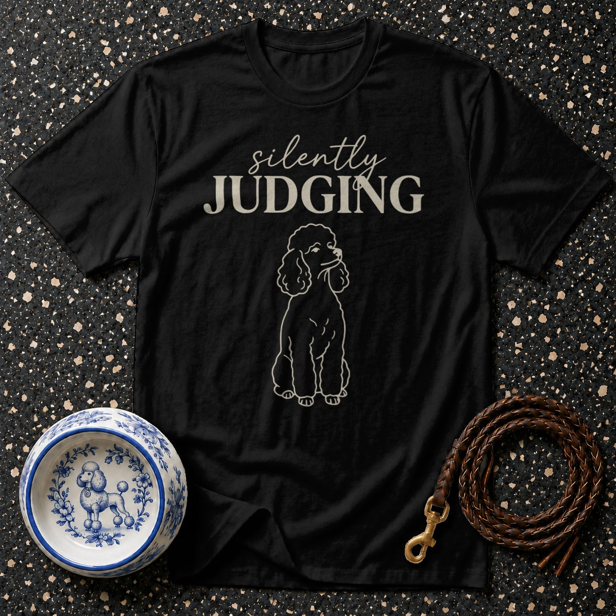 Black t-shirt with "silently JUDGING" text and a poodle outline.