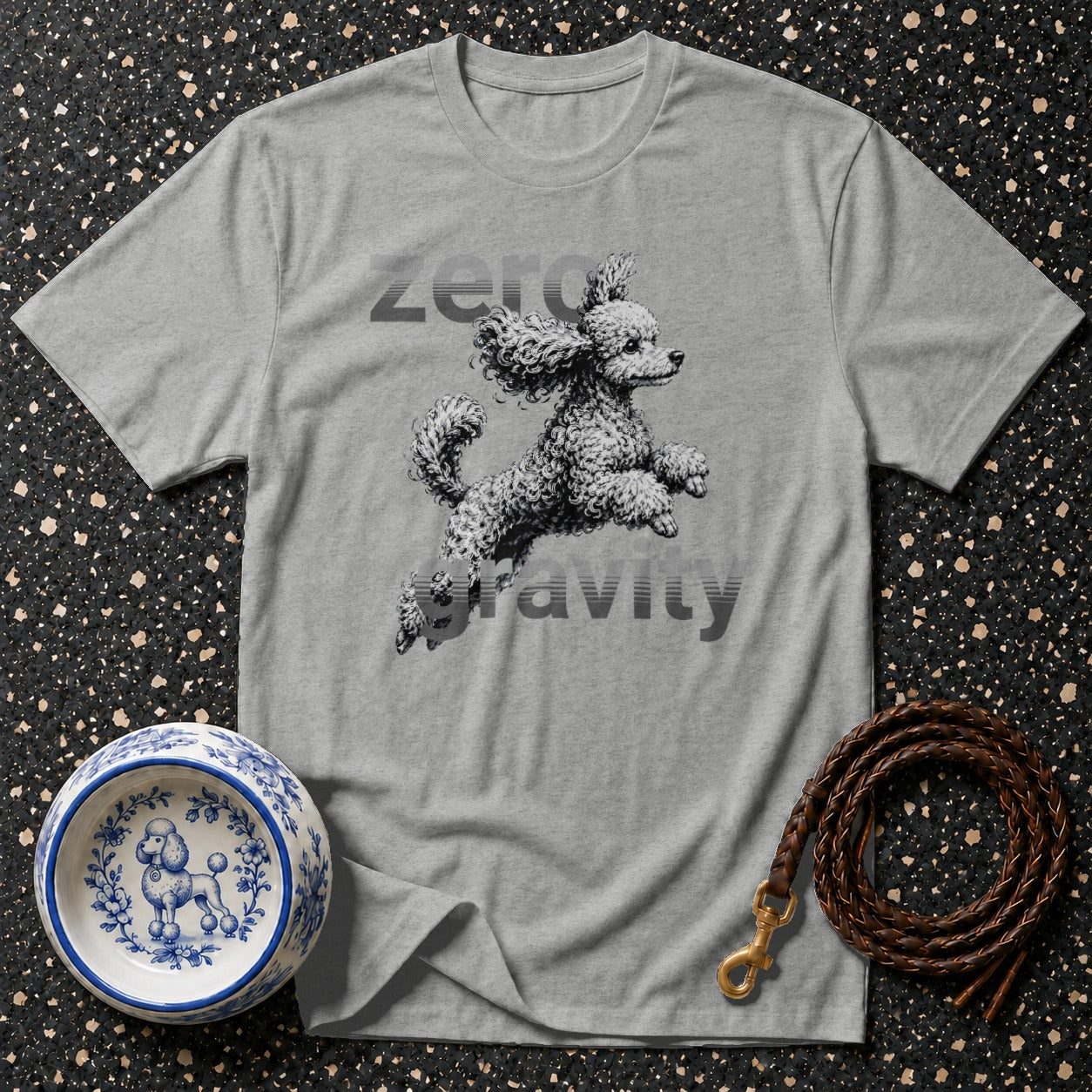 Grey t-shirt with jumping poodle graphic and "Zero Gravity" text.