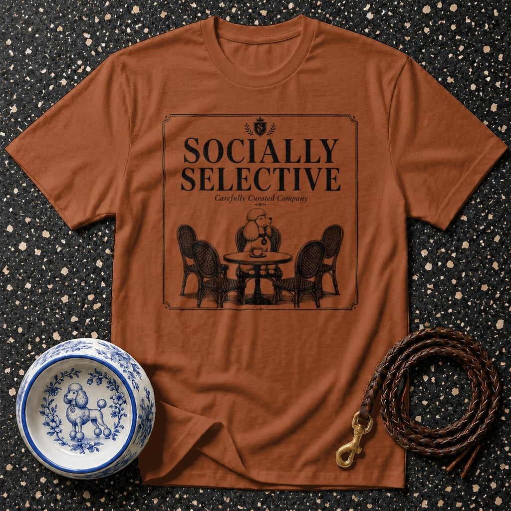 Brown t-shirt with "Socially Selective" text and poodle at cafe graphic.
