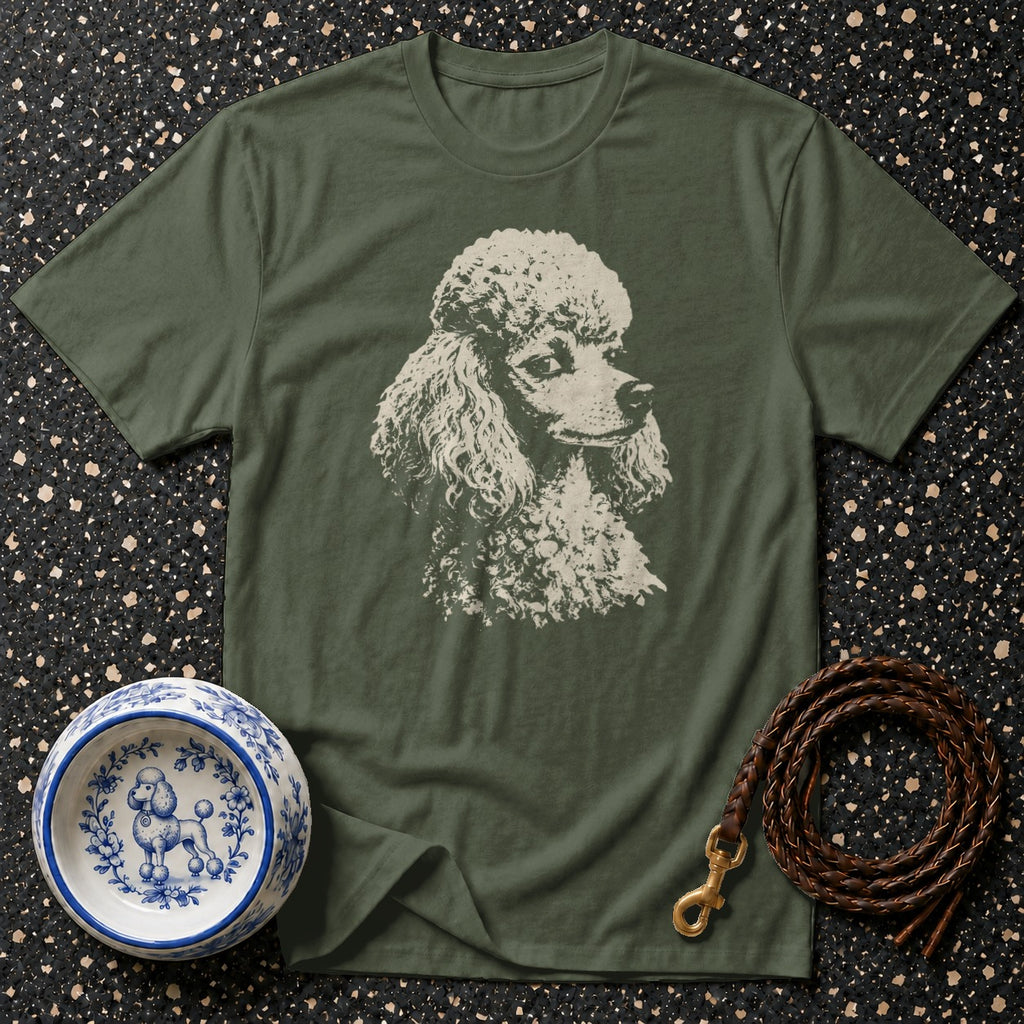 Olive green t-shirt with white poodle graphic, blue and white dog bowl, and leather leash.