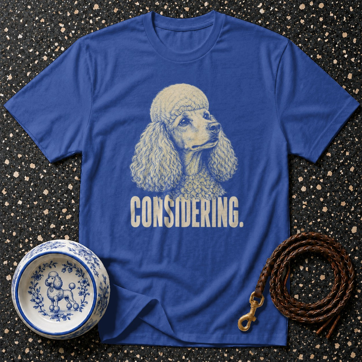 Royal blue t-shirt with poodle graphic and "CONSIDERING." text.