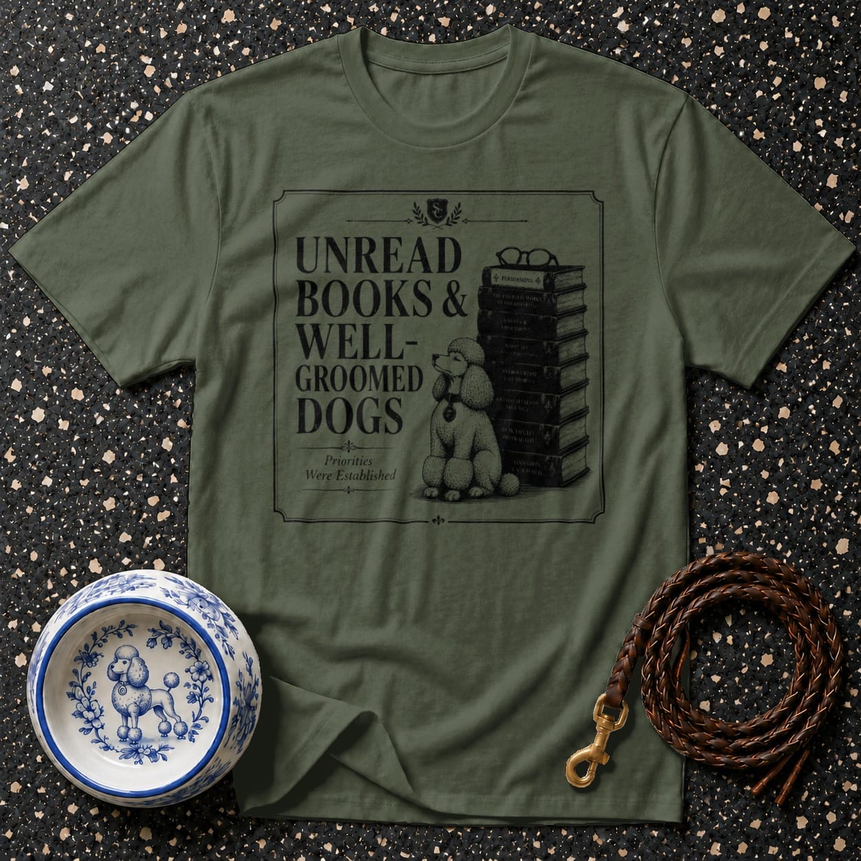 Olive green t-shirt with "Unread Books & Well-Groomed Dogs" design and a poodle.