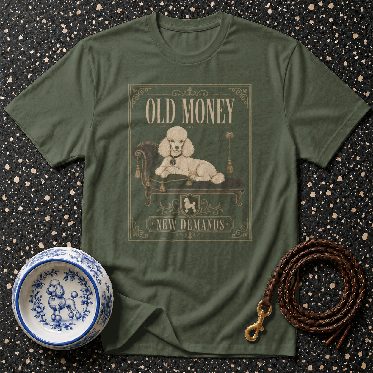 T-shirt with poodle on chaise lounge, text "OLD MONEY NEW DEMANDS".