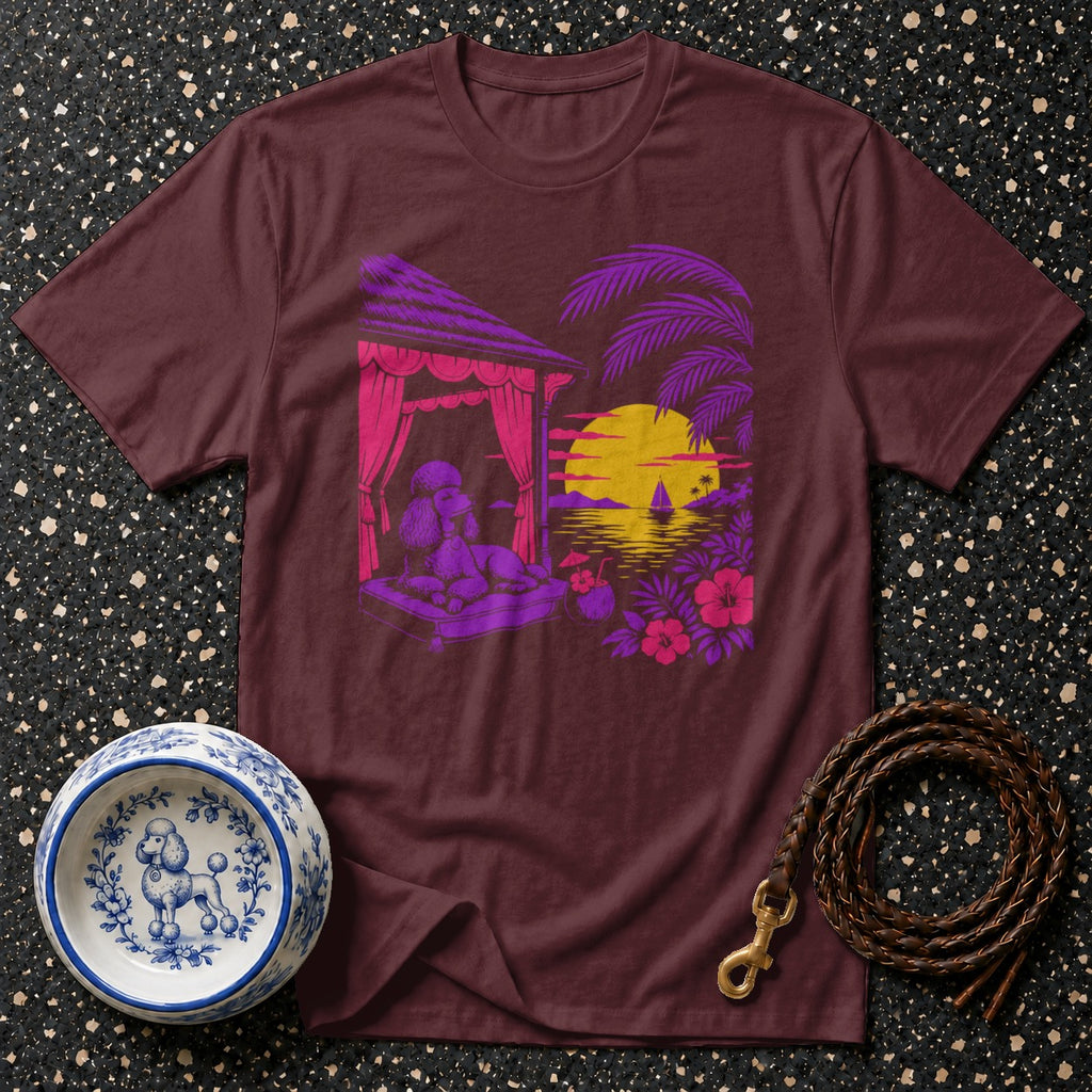 Maroon t-shirt with poodle relaxing in tropical sunset scene graphic.