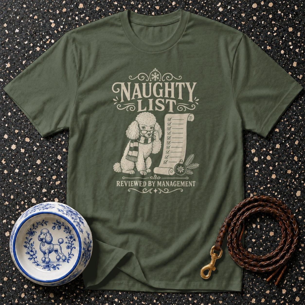 Green t-shirt with poodle graphic reading "Naughty List Reviewed by Management".