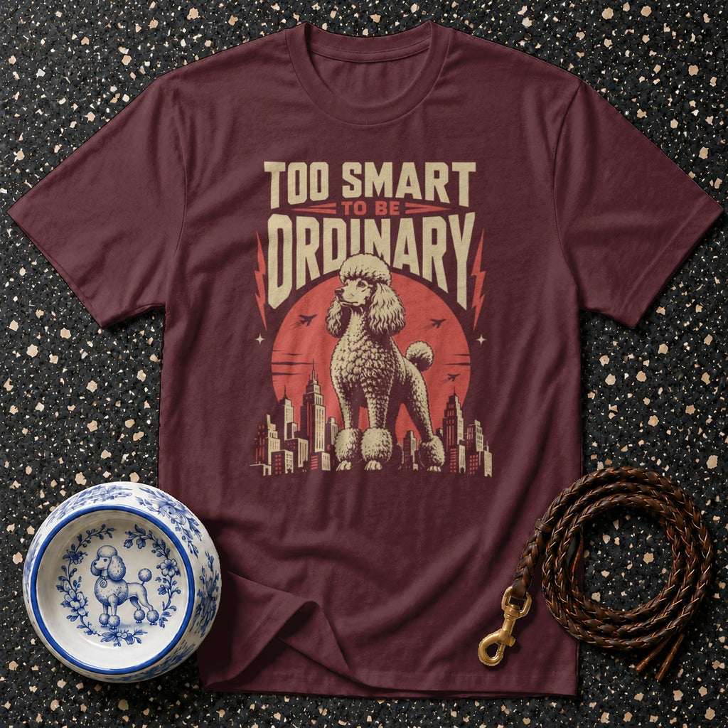 Maroon t-shirt with poodle and text "TOO SMART TO BE ORDINARY" graphic.