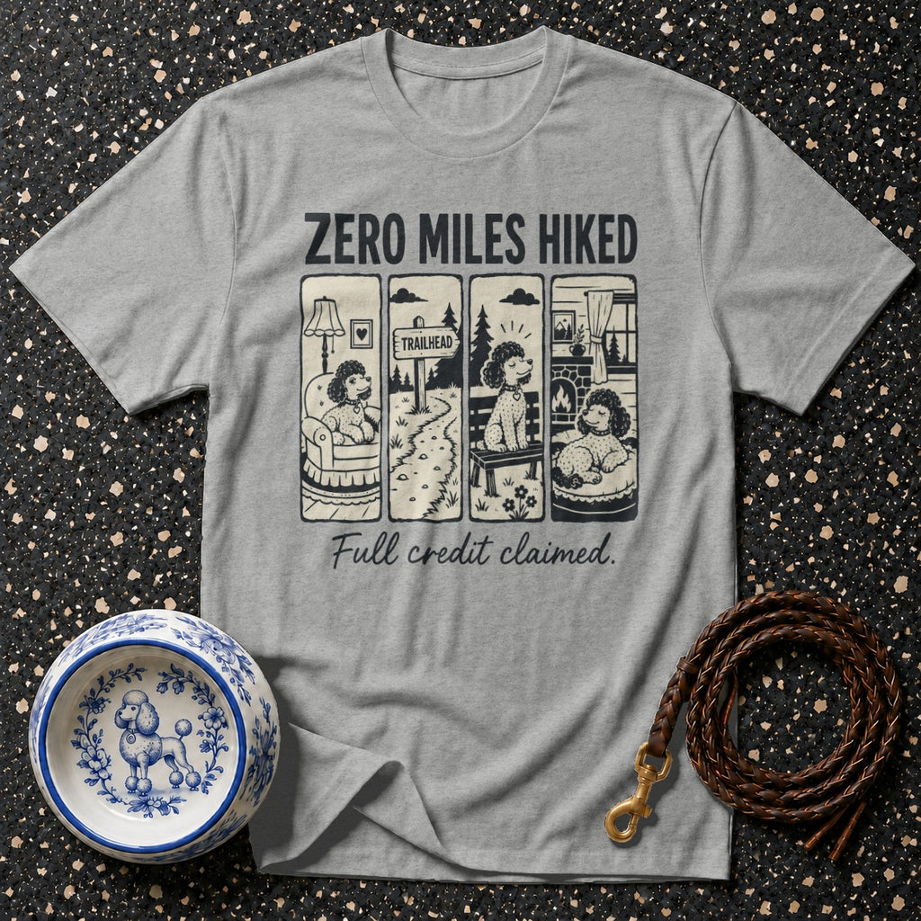 Grey t-shirt with four panels showing a poodle inside, at a trailhead, on a bench, and relaxing, with text "ZERO MILES HIKE, Full credit claimed."