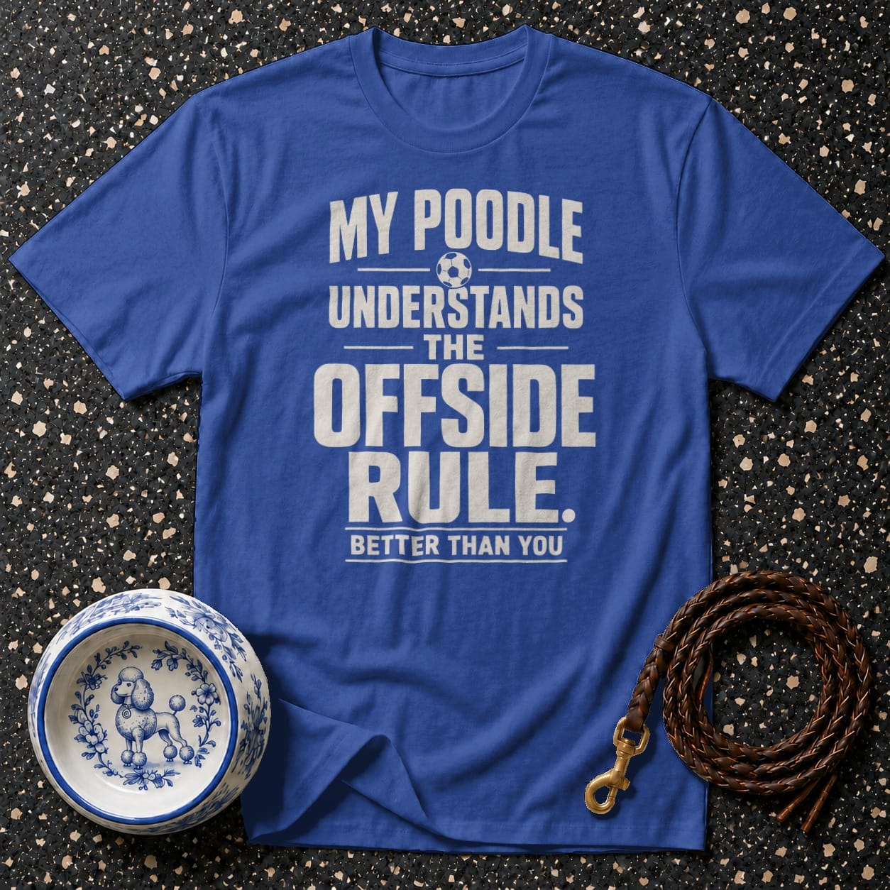 Blue t-shirt with text "My poodle understands the offside rule. Better than you."