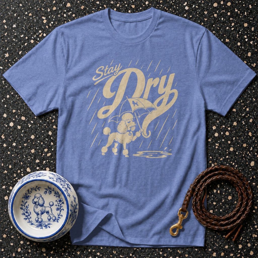 Blue t-shirt with tan poodle graphic under umbrella and text "Stay Dry".