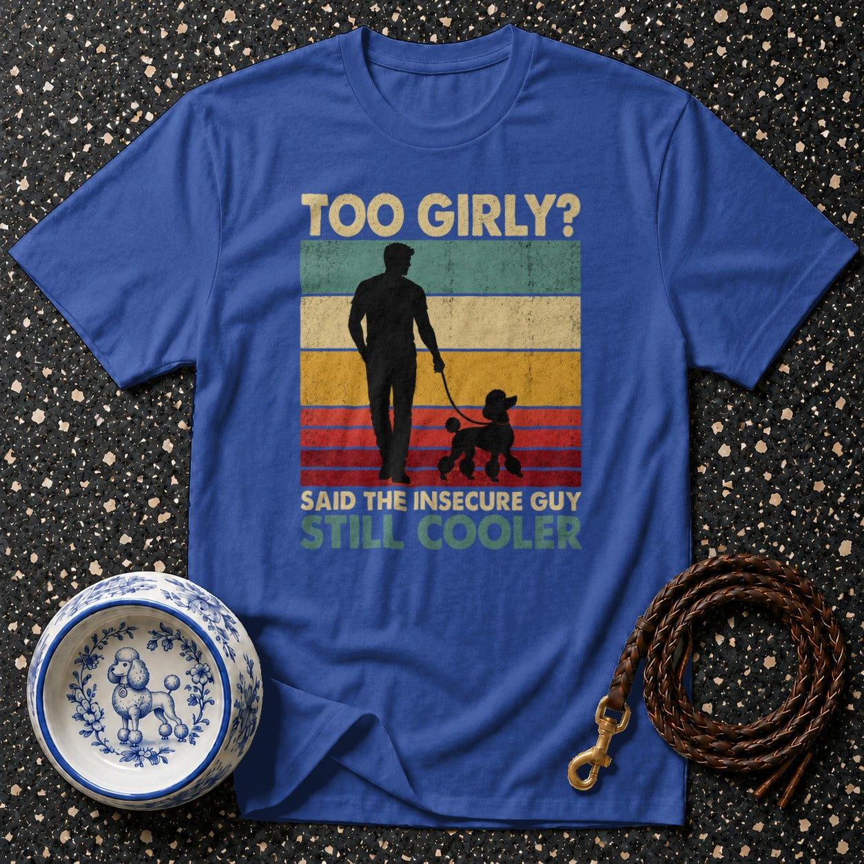 Blue t-shirt with "TOO GIRLY? SAID THE INSECURE GUY STILL COOLER" text and graphic.