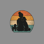 Silhouette of woman with two poodles against a retro sunset background.