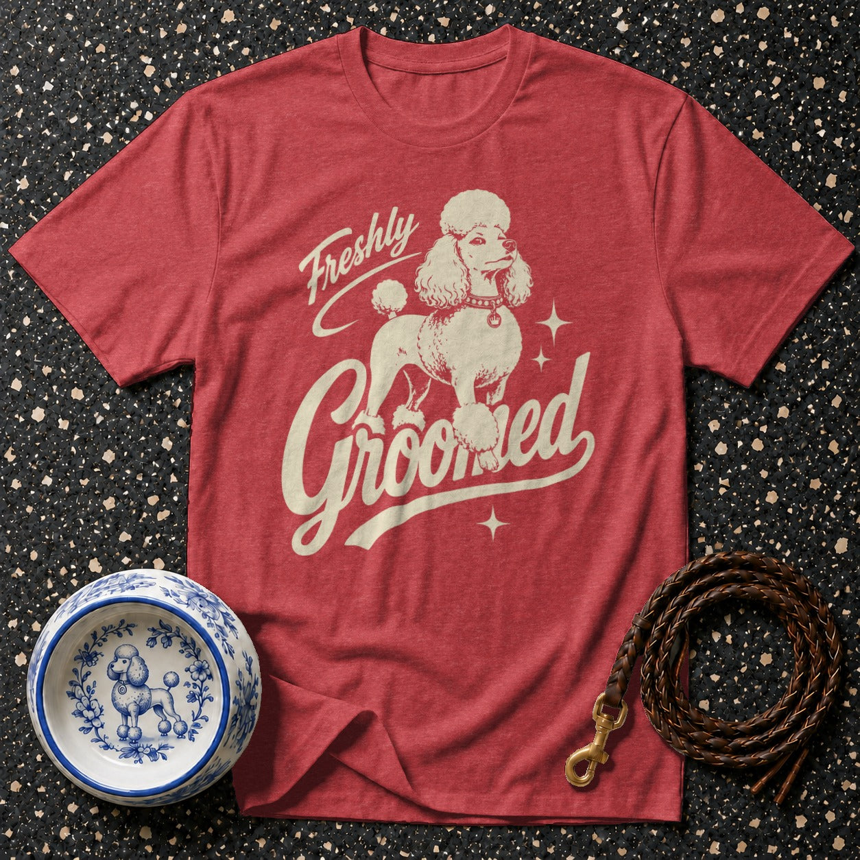 Red t-shirt with a white poodle graphic and text "Freshly Groomed".