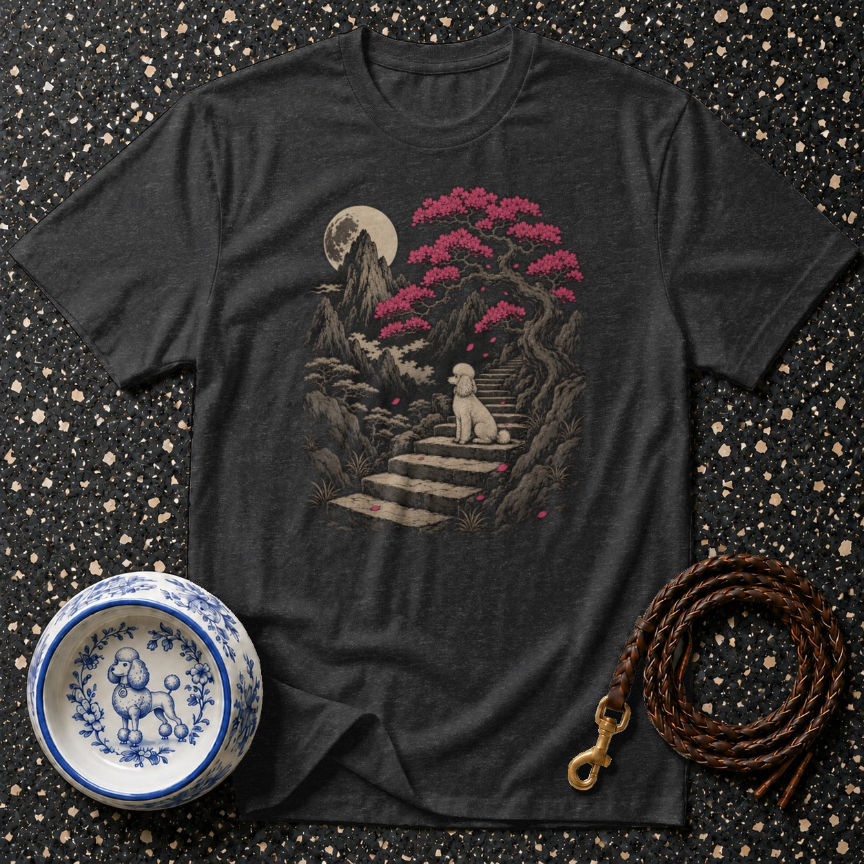 Dark grey t-shirt with a poodle sitting on stairs under a cherry blossom tree and moon.