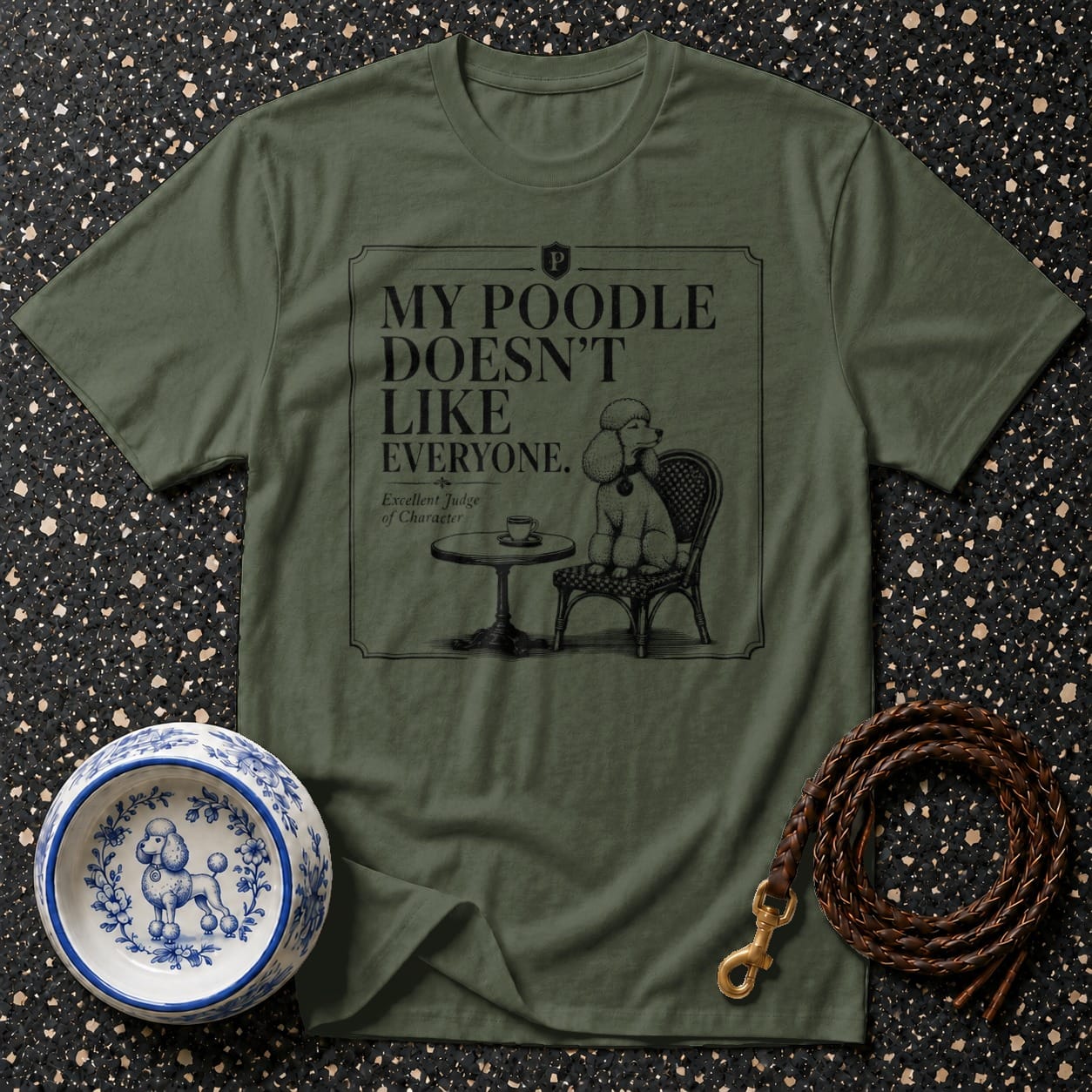 Olive green t-shirt with "My Poodle Doesn't Like Everyone" text and poodle illustration.
