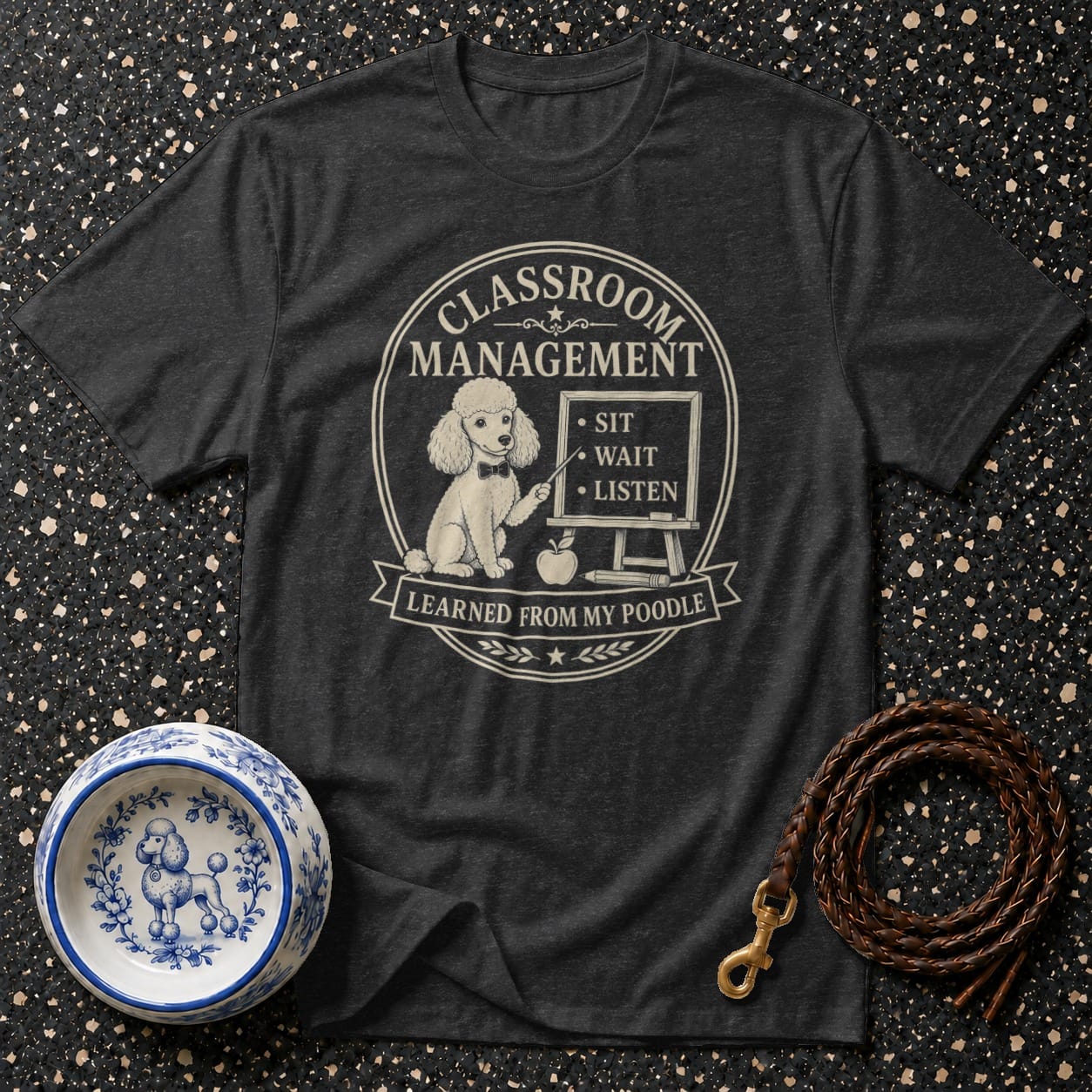 Dark t-shirt with poodle graphic: "Classroom Management Learned From My Poodle"