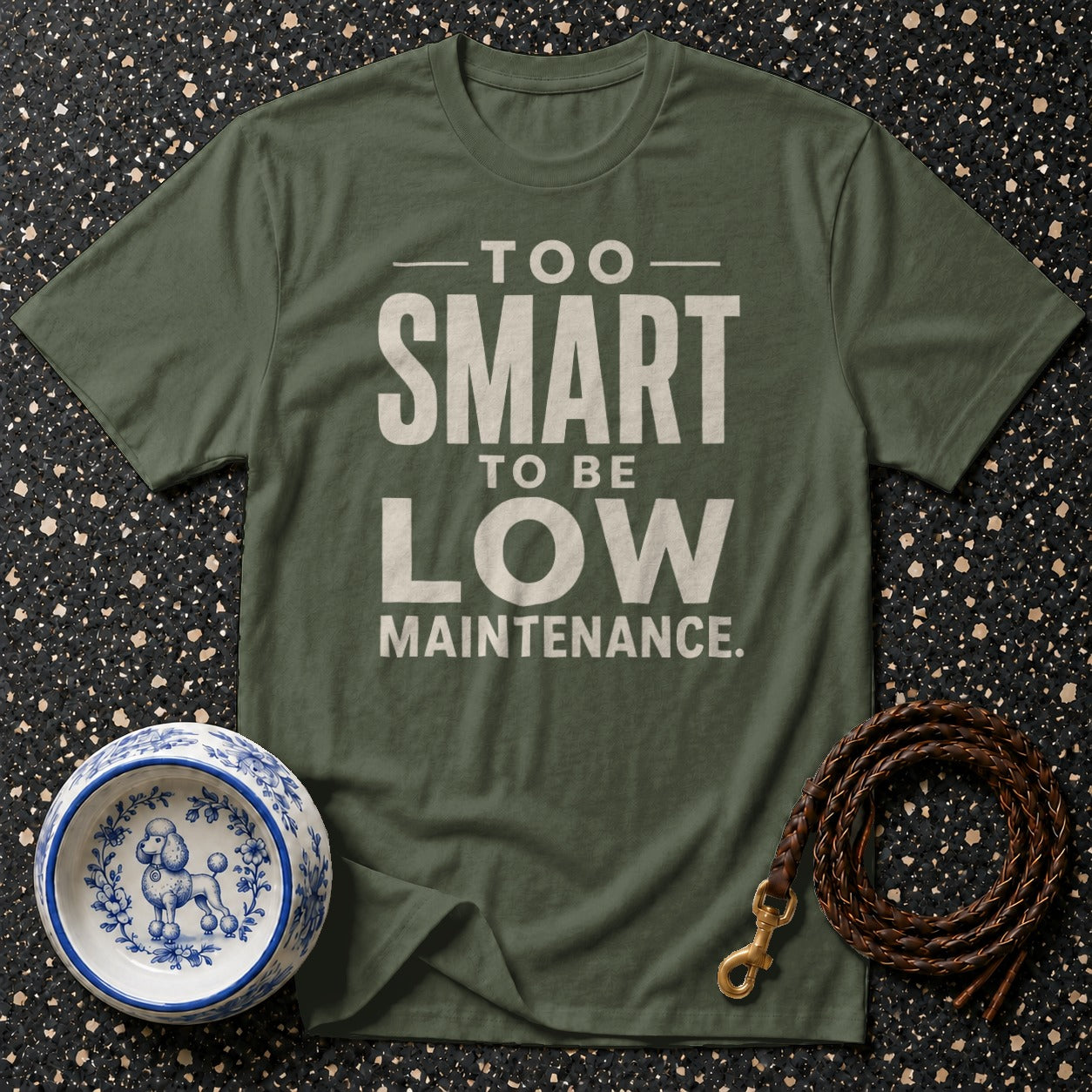 Olive green t-shirt with "Too Smart to Be Low Maintenance" text, dog bowl, and leash.