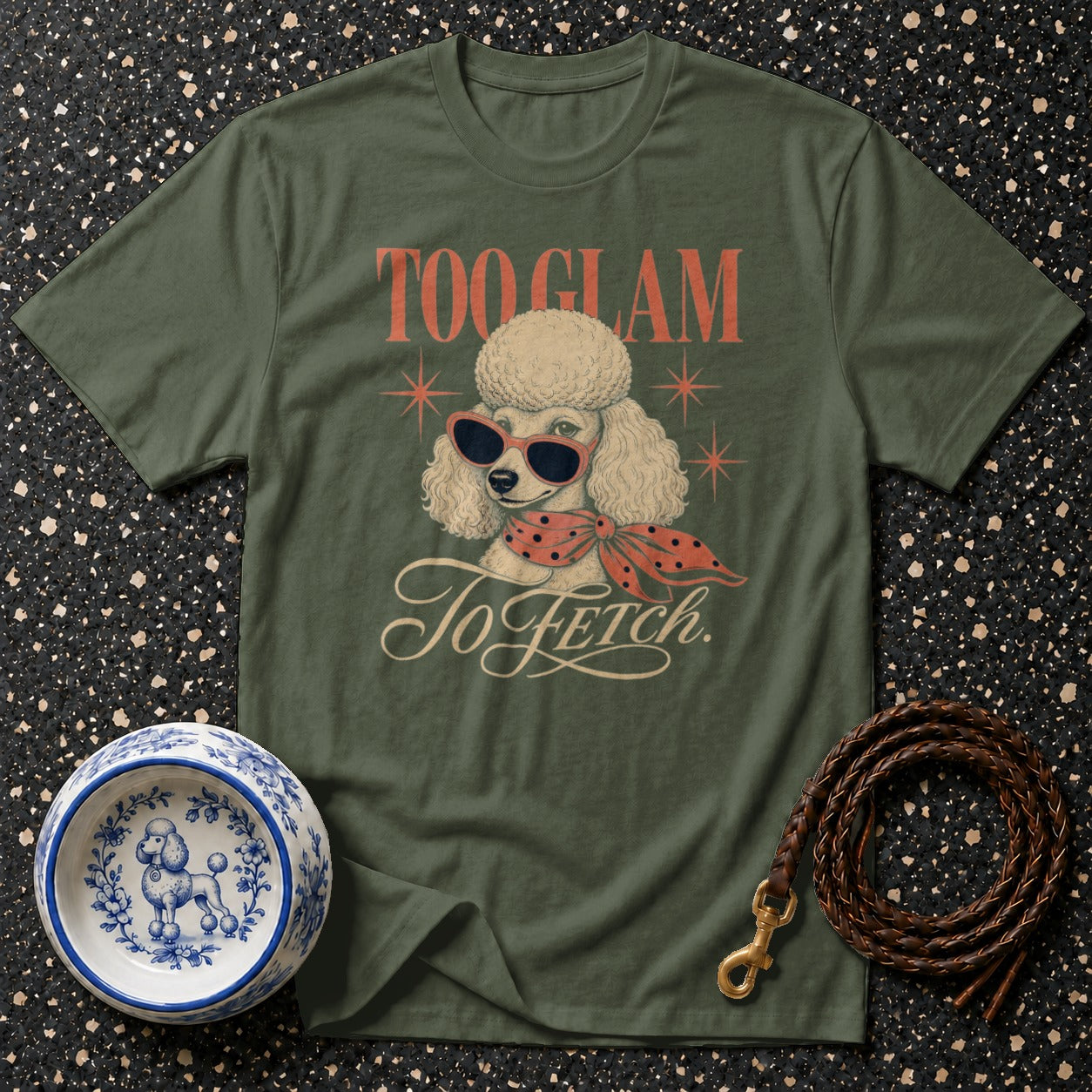 Olive green t-shirt with a poodle graphic and "Too Glam To Fetch" text.