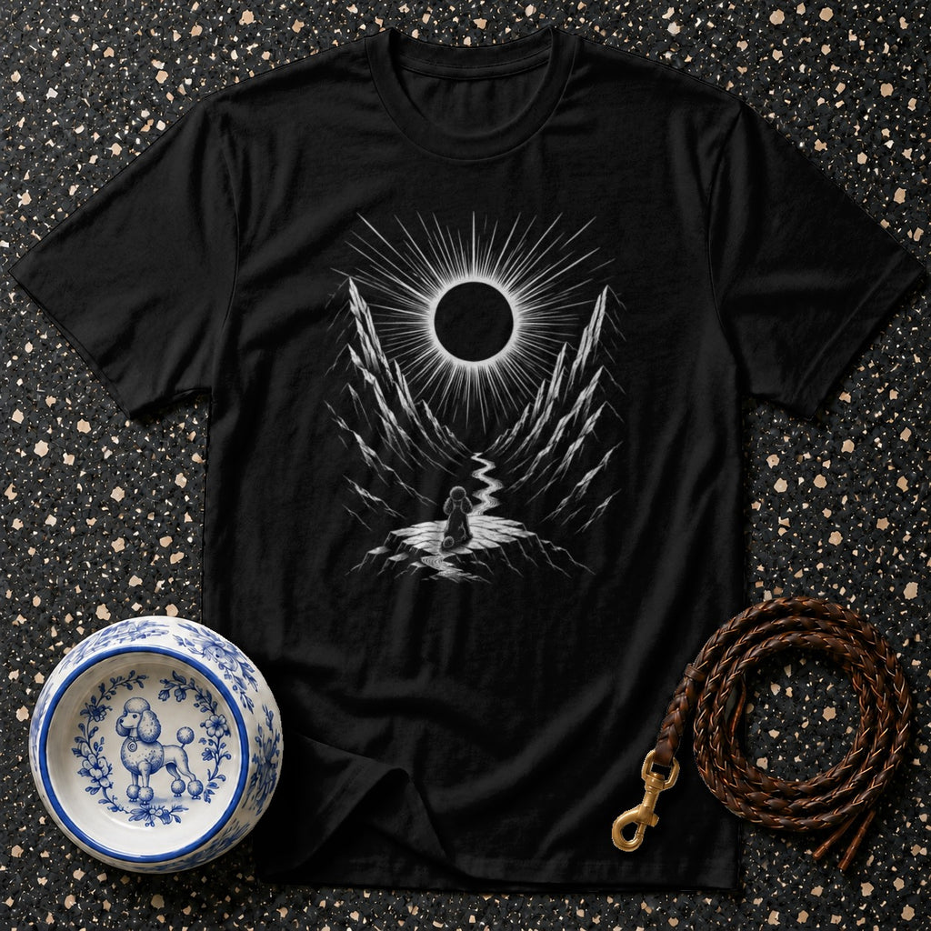 Black t-shirt with a stylized solar eclipse over a mountain valley.