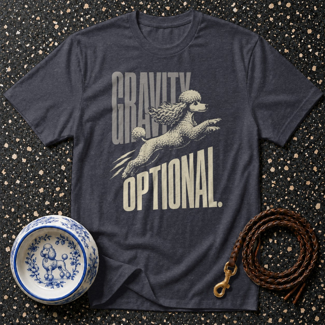Dark grey t-shirt with poodle graphic and text "GRAVITY OPTIONAL."